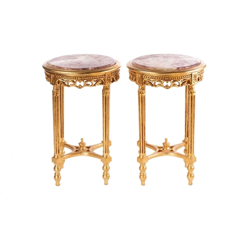 112 - A pair of Louis XVI style carved and gilt pedestal jardinières,20th century, with circular rouge mar... 