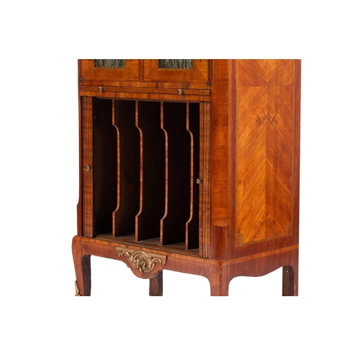 113 - A Louis XVI style marble topped rosewood music cabinet, late 19th/20th century, with a pair of tulip... 