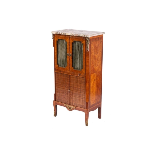 113 - A Louis XVI style marble topped rosewood music cabinet, late 19th/20th century, with a pair of tulip... 