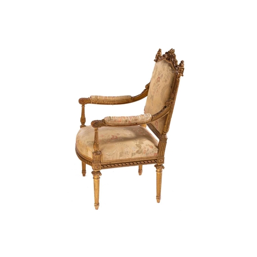 116 - In the manner of Antoine Gaillard; a finely carved wood and gilt gesso fauteuil, 19th century, with ... 