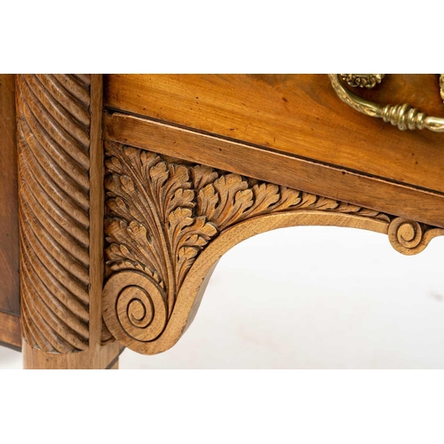 117 - A Regency mahogany sideboard, the rectangular top with rounded corners and ebony strung edge over a ... 