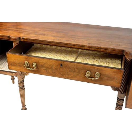 117 - A Regency mahogany sideboard, the rectangular top with rounded corners and ebony strung edge over a ... 