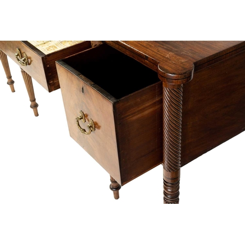 117 - A Regency mahogany sideboard, the rectangular top with rounded corners and ebony strung edge over a ... 