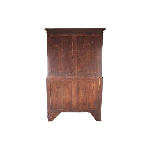 118 - A George III plum mahogany chest on chest, the cavetto cornice over two short and three long graduat... 