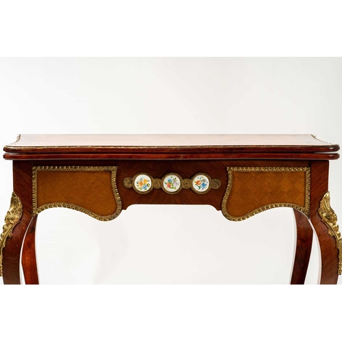 120 - A Louis XV style mahogany and cube parquetry fold over serpentine gaming table, 20th century, the sh... 