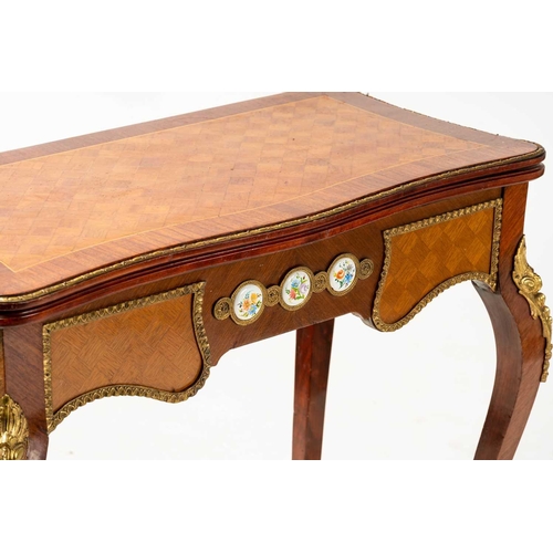 120 - A Louis XV style mahogany and cube parquetry fold over serpentine gaming table, 20th century, the sh... 