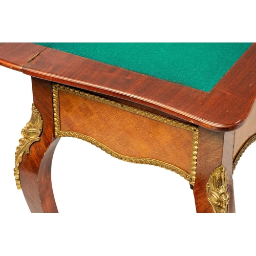 120 - A Louis XV style mahogany and cube parquetry fold over serpentine gaming table, 20th century, the sh... 