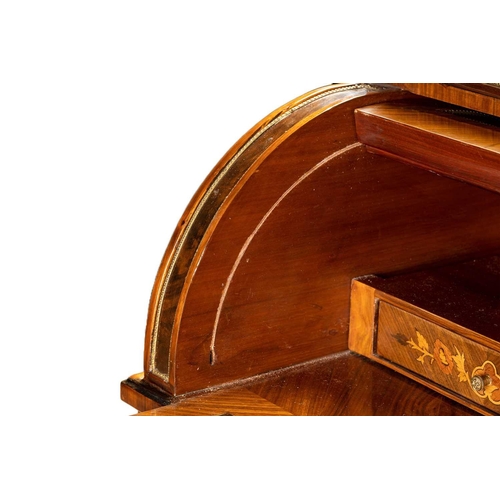 121 - A Louis XVI style marble topped king bureau de cylinder, 20th/21st century, with tulipwood crossband... 