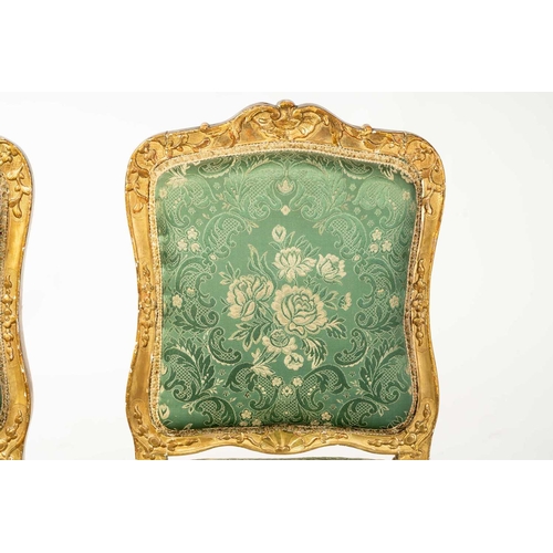 122 - A pair Louis XV style carved wood and gilt gesso salon chairs, 19th century, with shaped cresting ra... 