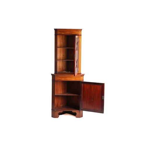 123 - An Edwardian mahogany and Neo-Classical marquetry inlaid freestanding corner display cabinet, in the... 