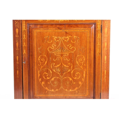 123 - An Edwardian mahogany and Neo-Classical marquetry inlaid freestanding corner display cabinet, in the... 