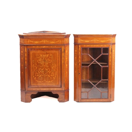 123 - An Edwardian mahogany and Neo-Classical marquetry inlaid freestanding corner display cabinet, in the... 