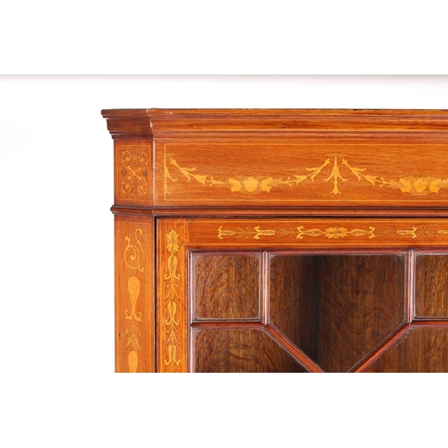 123 - An Edwardian mahogany and Neo-Classical marquetry inlaid freestanding corner display cabinet, in the... 