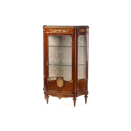 124 - A French Louis XVI style mahogany single door marble topped vitrine, late 19th century, of concave c... 