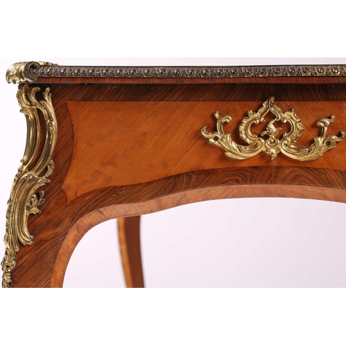 127 - A Louis XV-style satinwood and Kingwood crossbanded bureau plat, late 19th century, with tooled Moro... 