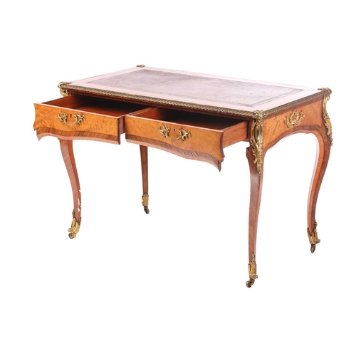 127 - A Louis XV-style satinwood and Kingwood crossbanded bureau plat, late 19th century, with tooled Moro... 