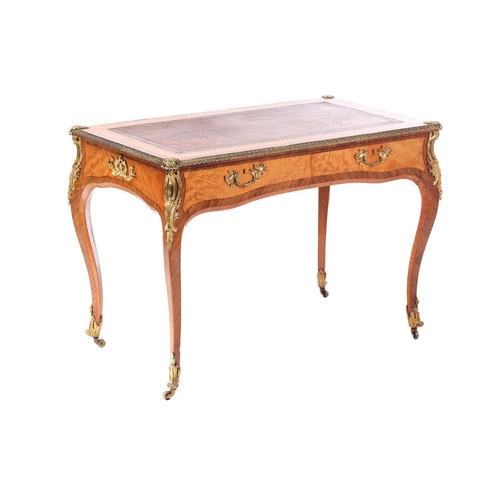 127 - A Louis XV-style satinwood and Kingwood crossbanded bureau plat, late 19th century, with tooled Moro... 