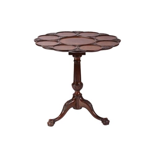 130 - A George III style mahogany revolving supper table, 20th century (but a faithful copy), the circular... 