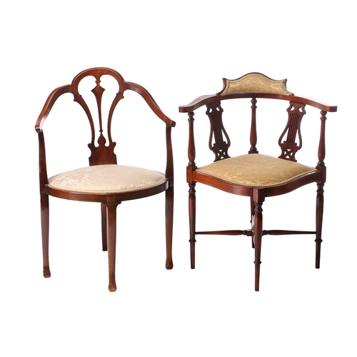 135 - Two Edwardian mahogany corner salon armchairs one with lure splat and one with oval seat, both with ... 