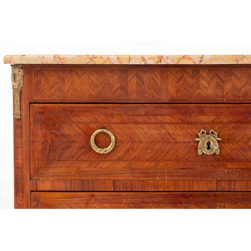 137 - An French Louis XVI style marble topped three drawer rosewood commode, early 20th century with geome... 