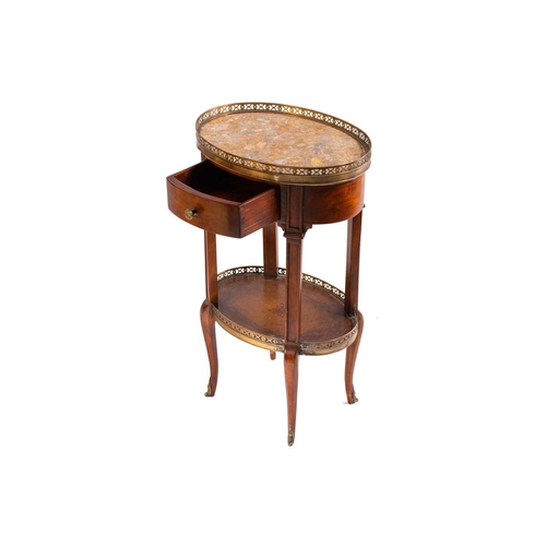 139 - A French Napoleon III style mahogany oval table en chiffonier with marble top, 20th century, with pi... 