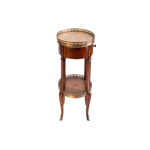 139 - A French Napoleon III style mahogany oval table en chiffonier with marble top, 20th century, with pi... 