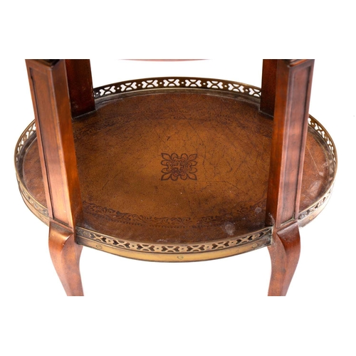 139 - A French Napoleon III style mahogany oval table en chiffonier with marble top, 20th century, with pi... 