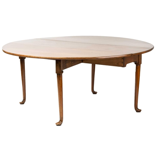 141 - A George II style walnut gateleg dining table, by David Prue for Brights of Nettlebed, the oval hing... 