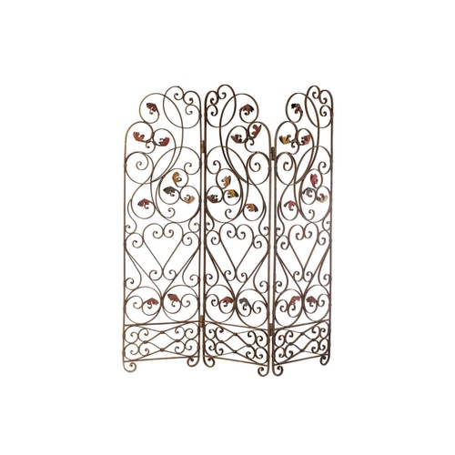 142 - An Italianate wrought iron three panel room screen, 20th century ,with verdigris painted scrolling t... 