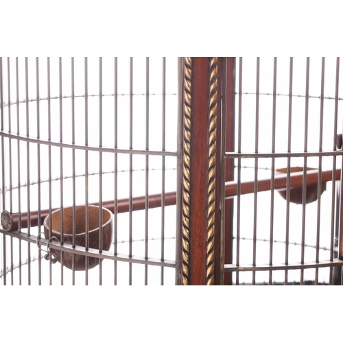 150 - An extremely large and impressive 19th century style cylindrical mahogany parrot cage,late 20th cent... 