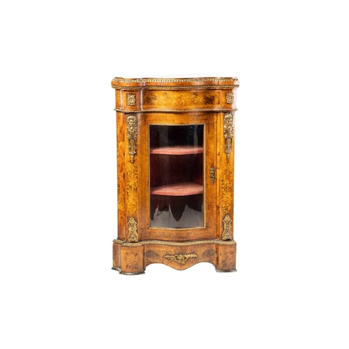 153 - An unusual Victorian Circassian walnut corner display cabinet (adapted) with single glazed serpentin... 