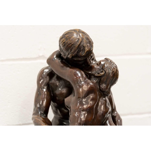 162 - After Augusta Rodin, 'The Kiss', a large paginated bronze figure on a square white marble base. 45 c... 