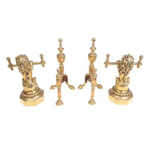 172 - A pair of Victorian cast and gilt brass heraldic sejant erect lion firedogs, each holding a decorati... 