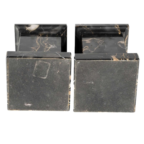 174 - A pair of variegated black marble obelisks, on ball feet and plinth bases, late 20th century, 52.5 c... 