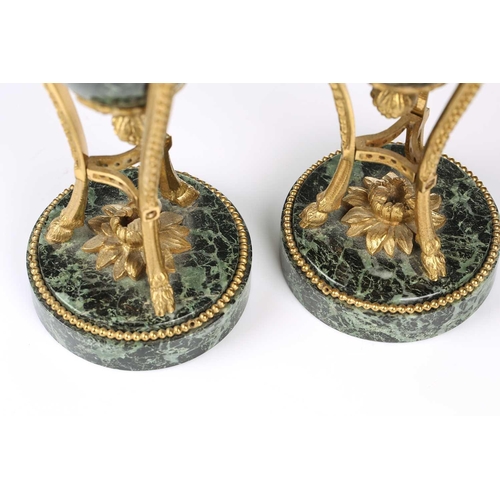 175 - A fine pair of Louis XVI style ormolu and variegated green marble cassolettes of classical urn form,... 