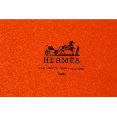 179 - A presentation boxed Hermes of Paris set of four porcelain individual ashtrays in colours with styli... 