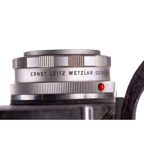 180 - A collection of loose Leica photography accessories to include a Leitz Leica Visoflex, a Leitz Leica... 