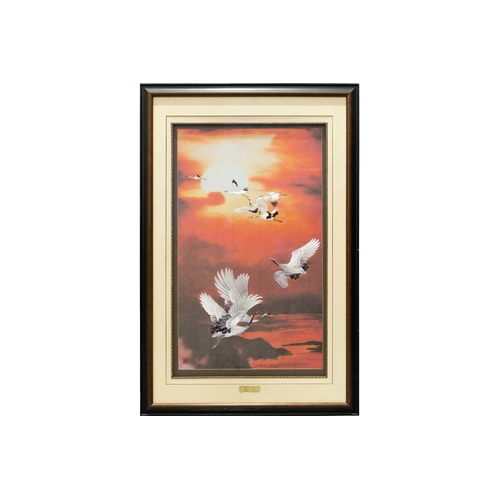 84 - A large Japanese embroidered picture of cranes in flight, 20th century, 98 cm x 57 cm framed and gla... 