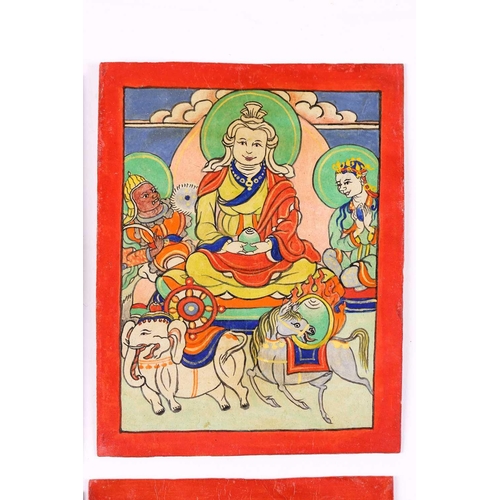 85 - A set of nine Tibetan tsakalis, initiation cards, hand painted with peaceful and wrathful deities, a... 