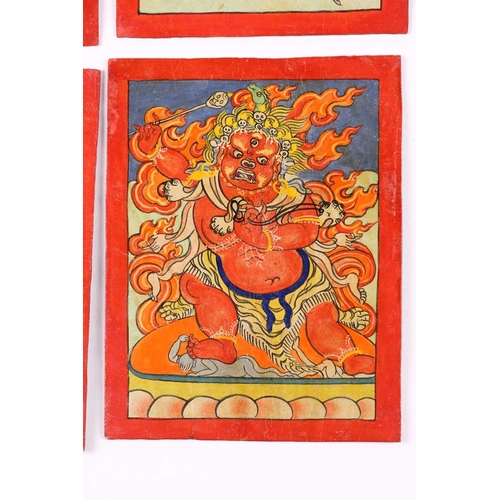 85 - A set of nine Tibetan tsakalis, initiation cards, hand painted with peaceful and wrathful deities, a... 