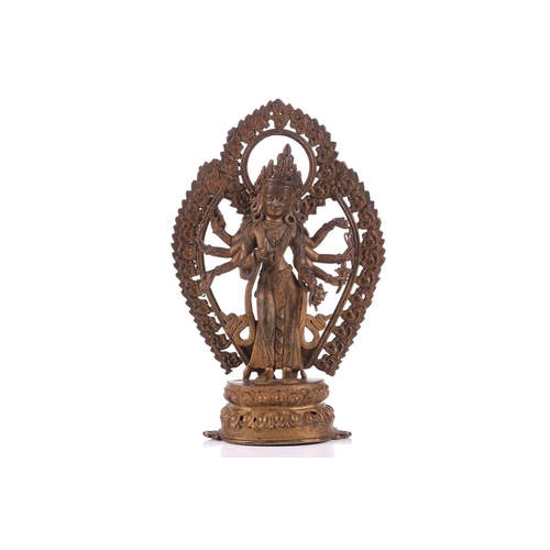 88 - A Nepalese bronze figure of Bodhisattva Avalokiteshvara, early 20th century, the eight armed deity h... 