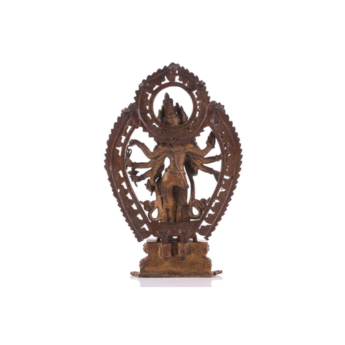 88 - A Nepalese bronze figure of Bodhisattva Avalokiteshvara, early 20th century, the eight armed deity h... 