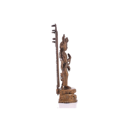 88 - A Nepalese bronze figure of Bodhisattva Avalokiteshvara, early 20th century, the eight armed deity h... 