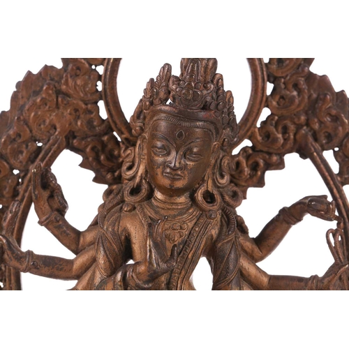 88 - A Nepalese bronze figure of Bodhisattva Avalokiteshvara, early 20th century, the eight armed deity h... 