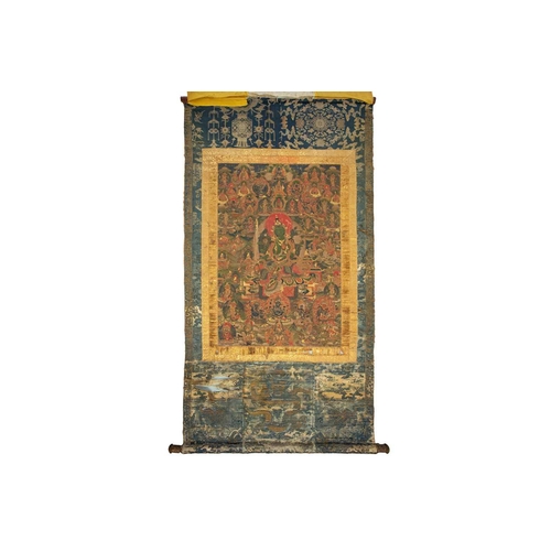 92 - A Tibetan Green Tara - sGrol-ma, possibly 18th century, surrounded by buddhas, divinities and Dalai ... 