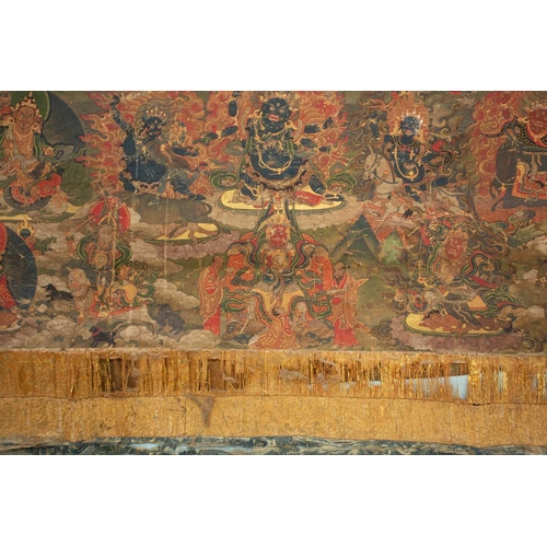 92 - A Tibetan Green Tara - sGrol-ma, possibly 18th century, surrounded by buddhas, divinities and Dalai ... 