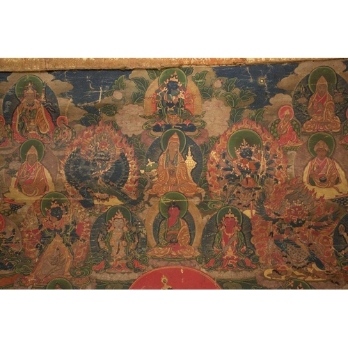 92 - A Tibetan Green Tara - sGrol-ma, possibly 18th century, surrounded by buddhas, divinities and Dalai ... 