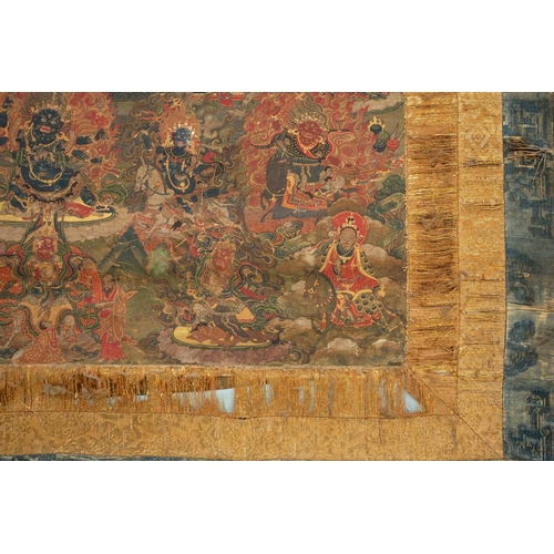 92 - A Tibetan Green Tara - sGrol-ma, possibly 18th century, surrounded by buddhas, divinities and Dalai ... 