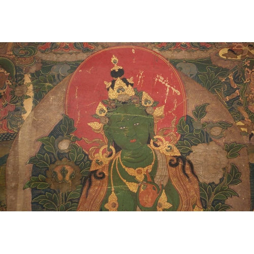 92 - A Tibetan Green Tara - sGrol-ma, possibly 18th century, surrounded by buddhas, divinities and Dalai ... 