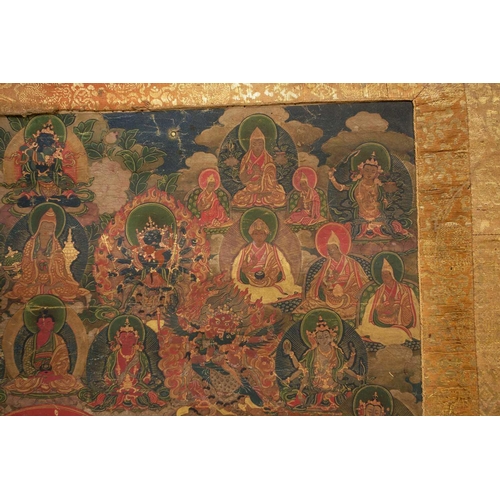 92 - A Tibetan Green Tara - sGrol-ma, possibly 18th century, surrounded by buddhas, divinities and Dalai ... 